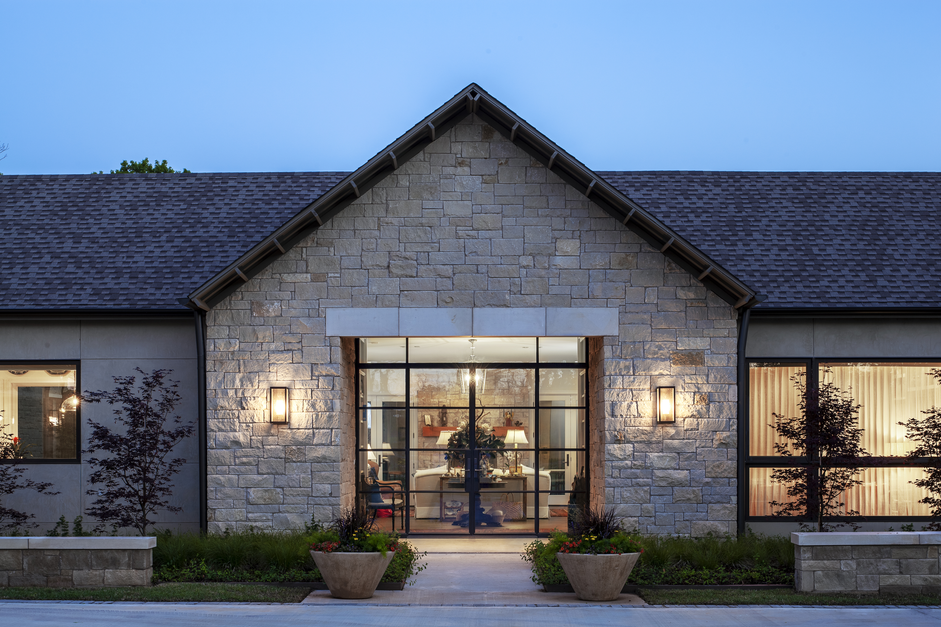 Stone exterior of Texas breezeway for custom home