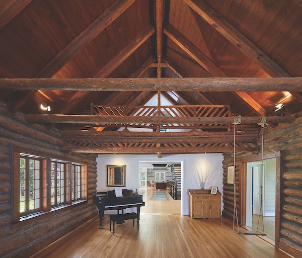 log cabin living room with A-frame ceiling