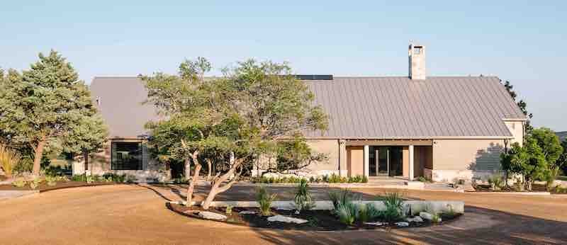 Texas vacation home with rough-faced limestone