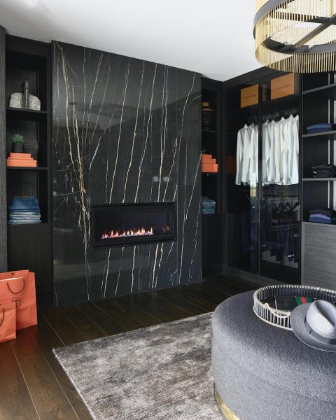 His master closet with fireplace
