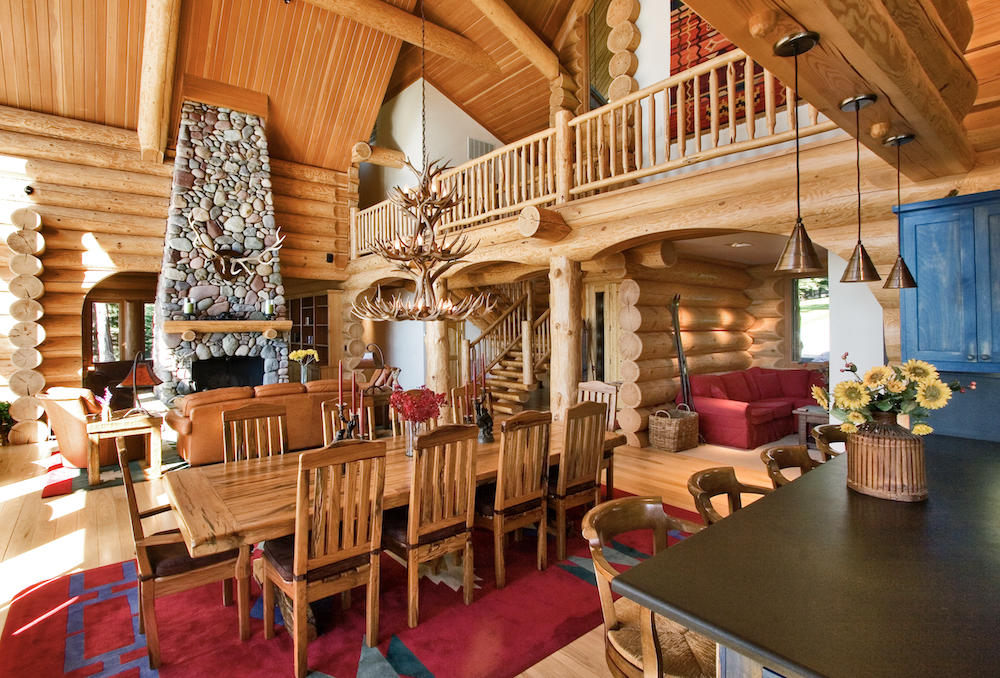 custom log cabin interior balcony and dining room