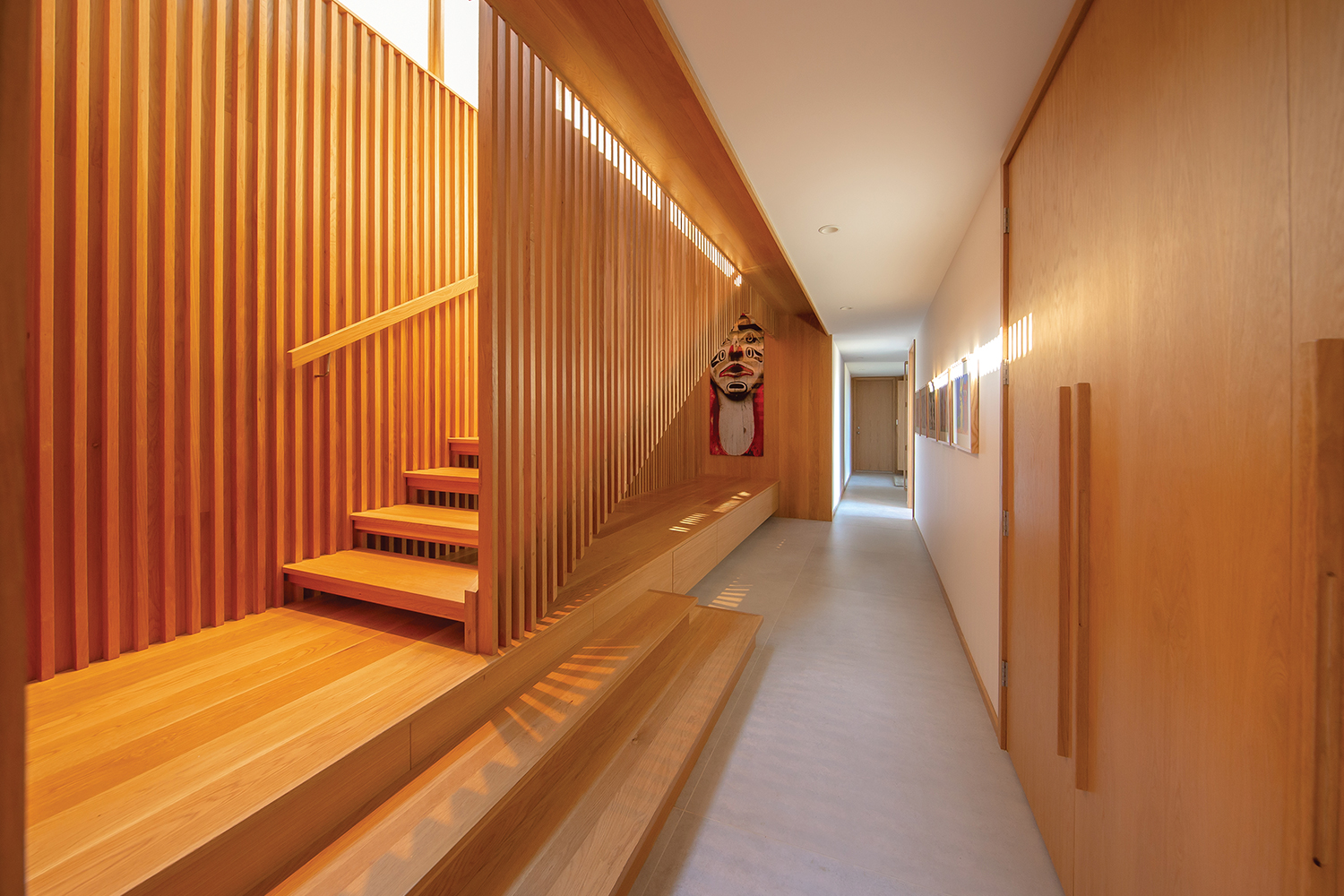Offering both privacy and transparency, wood slats provide window screening