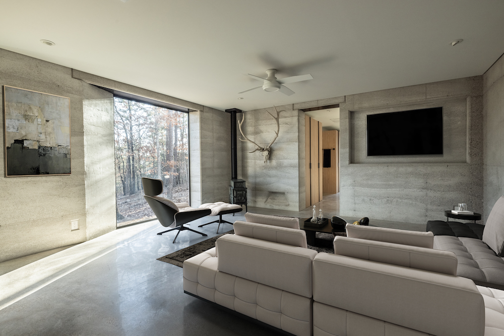rammed earth home living room 