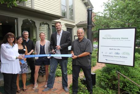 Evolutionary Home Builders ribbon cutting